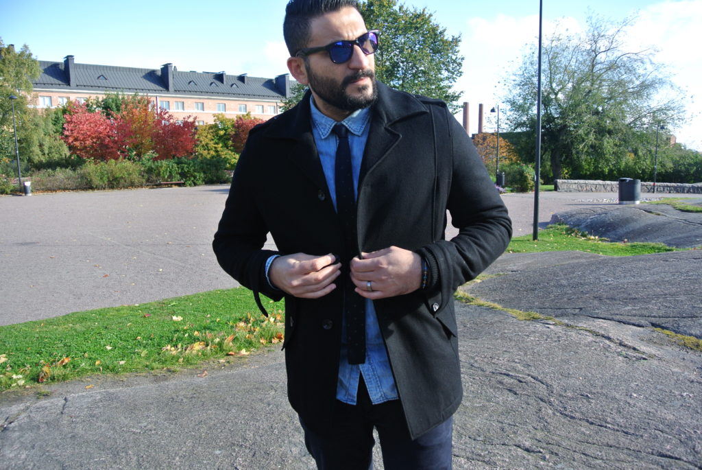 Sunday Handsome arabic man smart casual fall outfit Finland 
