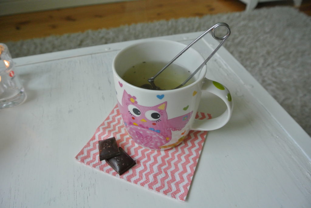 Weekend tea time tea cup of a table dark chocolate cute napkin