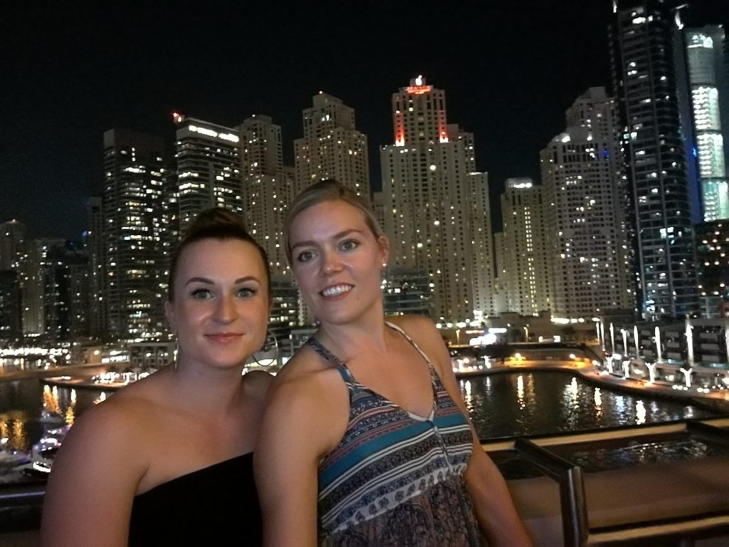 Dubai by night Dubai Marina Hotel Address two girls enjoying the view over the water