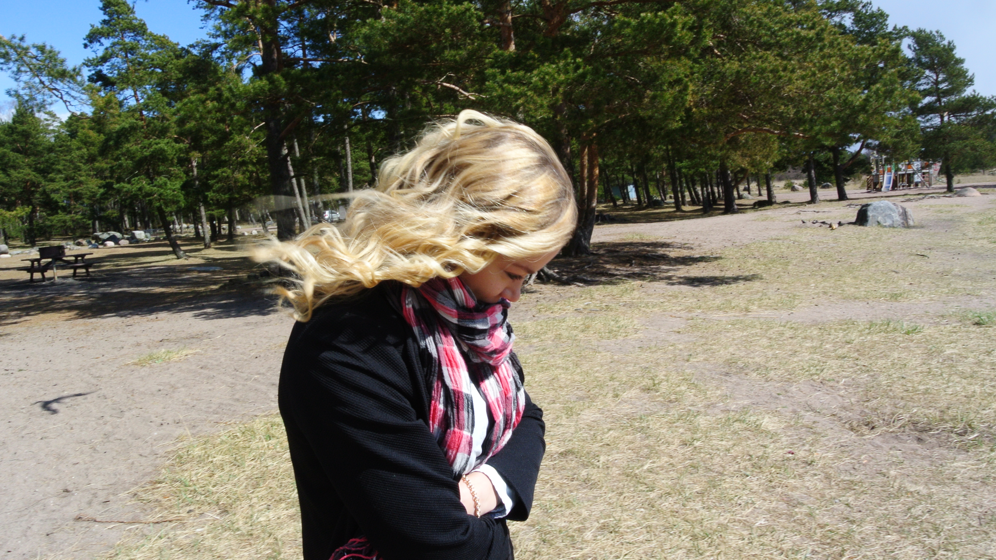 Kallahdenniemi A girl with blonde curly hair at windy Kallahdenniemi beach